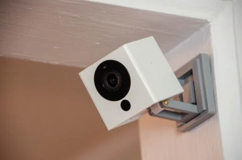 White security camera mounted on a door Stock Photos