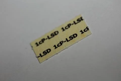 White self made lsd papers colorful drugs macro background and wallpapers i.. Stock Photos