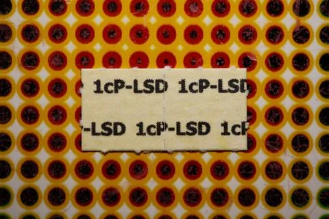 White self made lsd papers colorful drugs macro background and wallpapers i.. Stock Photos