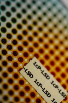 White self made lsd papers colorful drugs macro background and wallpapers i.. Stock Photos