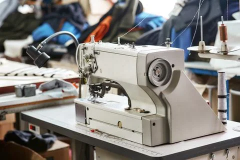 White sewing machine with threads Stock Photos