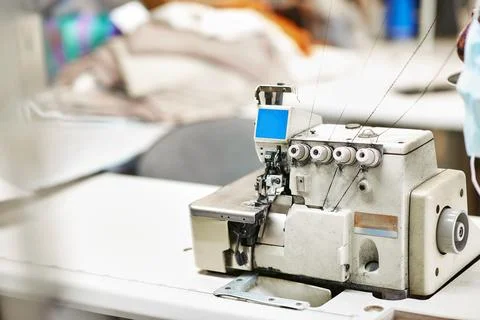 White sewing machine with threads Stock Photos