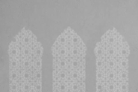 White shadow of three arched mosque windows on the wall Illustrazione stock
