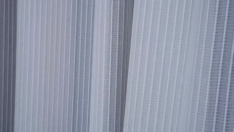 White sheer curtain blowing gently in the wind. Stock Footage 343551960