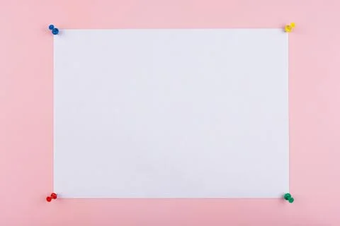 White sheet fastened with clerical multi-colored buttons Stock Photos