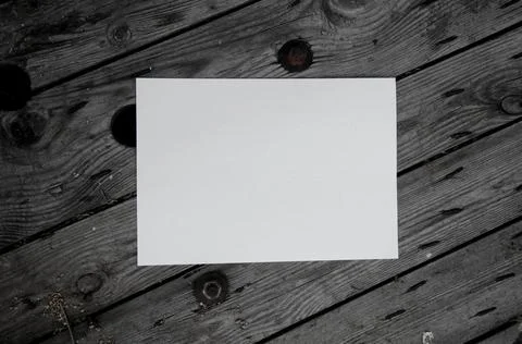 White sheet on a gray background. Stock Photos
