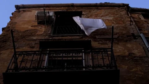White sheet hanging on a balcony. Stock Footage 150772450