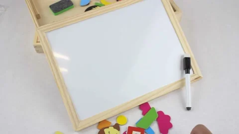 On a white sheet it is written A Ð’ C. Next are pencils and geometric shapes. Stock Footage 134467526