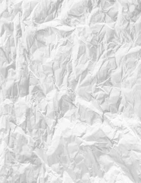 White sheet of paper battered with texture. Stock Photos