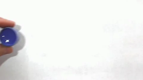 White sheet of paper, paint brush and ink strips. Stock Footage 17441348