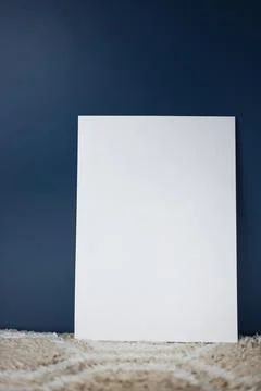 A white sheet of paper stands vertically Stock Photos