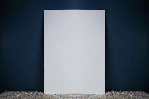 A white sheet of paper stands vertically Stock Photos