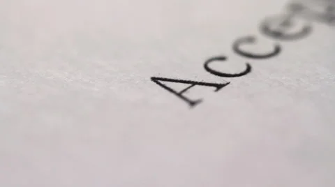 On a white sheet says "accept". slider shot. Видео 1340552