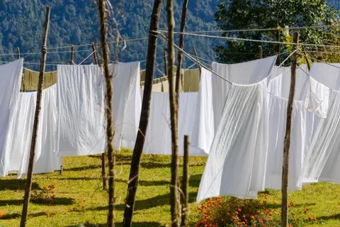 White sheets drying Stock-Fotos
