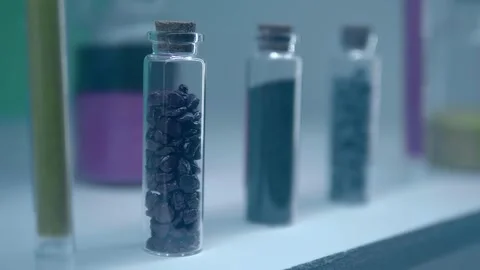 On a white shelf in a chemistry lab are samples of chemical reagents in flasks Stock Footage 340630267