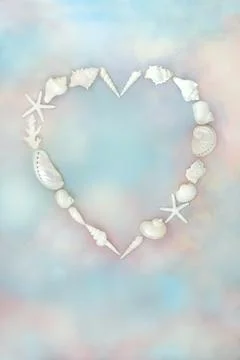 White Shell Heart Shape Romantic Wreath on Sky Background Stock Photos