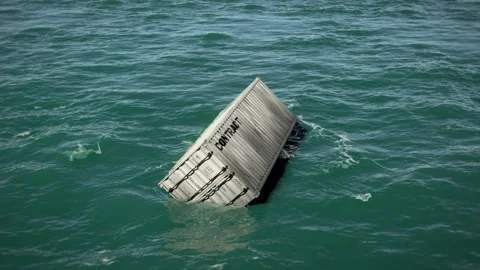 White Shipping Container in the Turquoise Sea Stock Footage 313934587