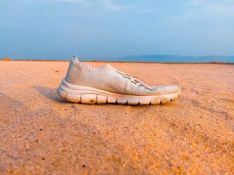 A white shoes in Sand desert Stock Photos