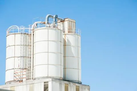 White silos for lime Stock Photos