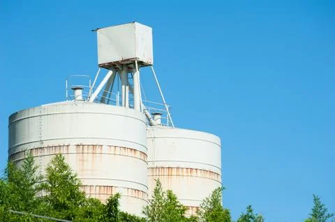 White silos for the storage Stock Photos