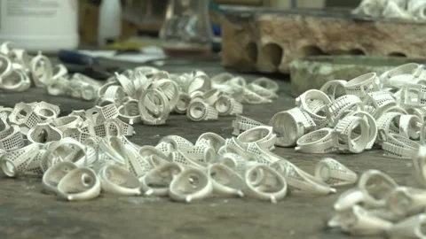 White silver ring molds. hand made man silver rings. ring production Stock Footage 139719251