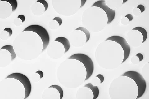 White simple geometric background with flying circles in shine hard light wit Foto stock