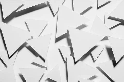White simple geometric background with flying triangles in hard light with bl Foto stock