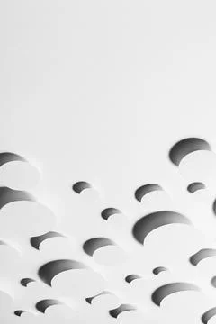 White simple geometric background with flying ovals in hard light with contra Stock Photos
