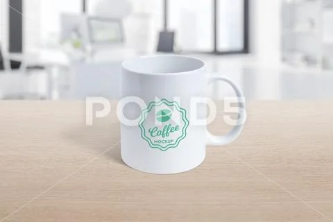 White simple mug on the table with logo mockup PSD Template