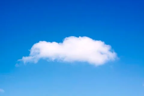 White single cloud in the blue sky Stock Photos