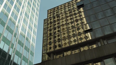 White Skyscraper reflection on black building, windows at business district in Видео 119361290