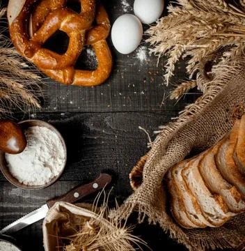 White sliced bread with two eggs on the table Stock Photos
