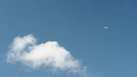 White small airplane in blue sky with cloud Stock Footage 236181749