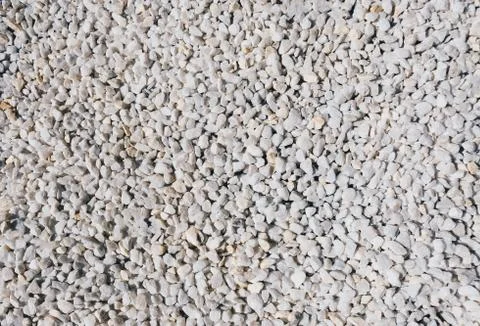 White small stones pattern texture background. Stock Photos