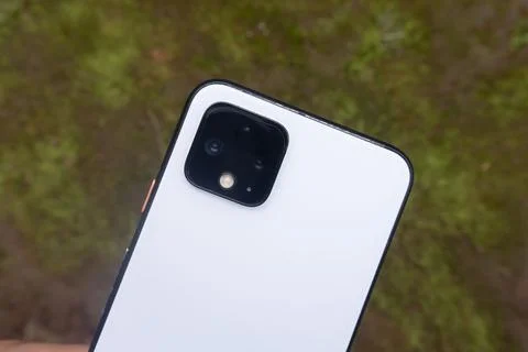 White Smartphone Camera Module Close Detail on Blurred Background Stock Photos