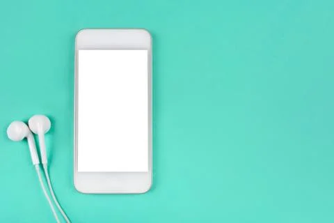 White smartphone on mint background. Foto stock