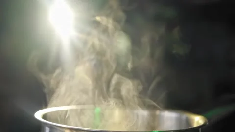 White smoke and steam effect from hot pot on black background. Stock Footage 170232986