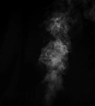 White smoke on black background. Figured smoke on a dark background. Abstract Stock Photos