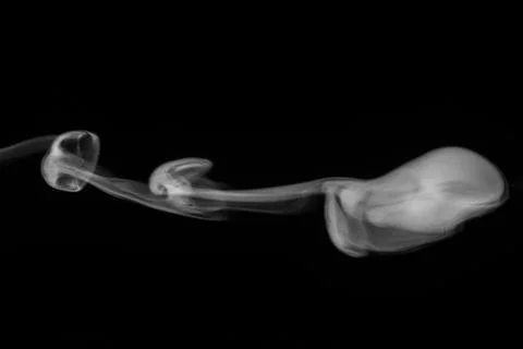 White smoke on black background. Figured smoke on a dark background. Abstract Stock Photos