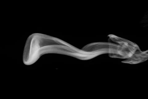 White smoke on black background. Figured smoke on a dark background. Abstract Stock Photos
