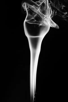 White smoke on black background Stock Photos