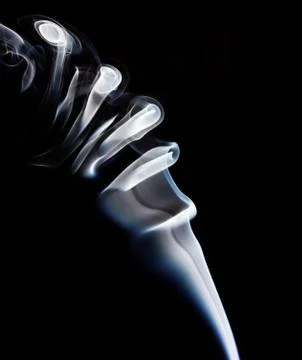 White smoke on black background Stock Photos