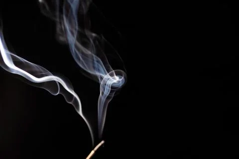 White smoke on a black background Stock Photos