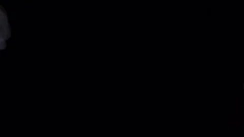 White smoke on the black background slow motion Stock Footage 75791174