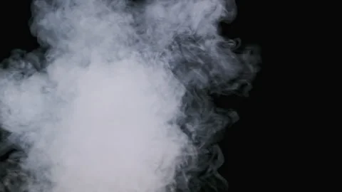 White Smoke on a Black Background in Slow Motion, Explosion Steam Stock Footage 252013386