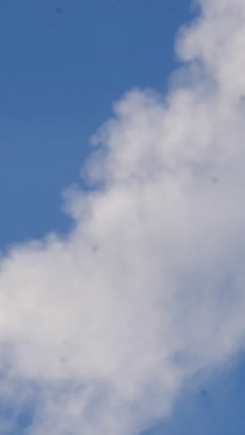 White smoke in a blue sky Stock Footage 232298153