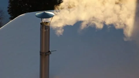 White smoke comes from a chimney, building heating. Stock Footage 168577177
