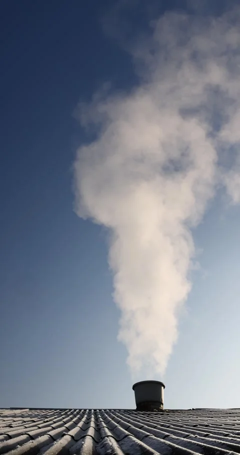 White smoke coming from a pipe against a blue sky background, white steam coming Stock Footage 323041617