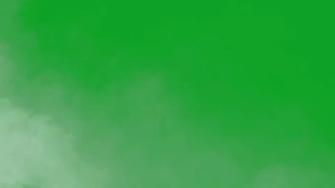 White smoke element drifting across a chroma key green screen for video overlays Stock Footage 332673456