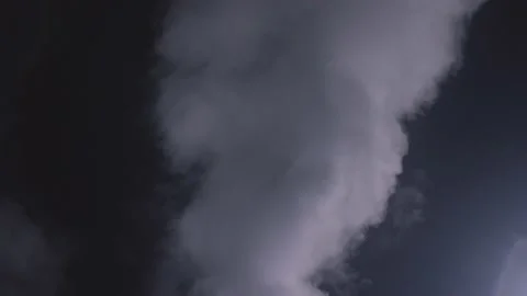 White smoke from a fire on a black background in slow motion recorded with the Stock-Footage 230459490